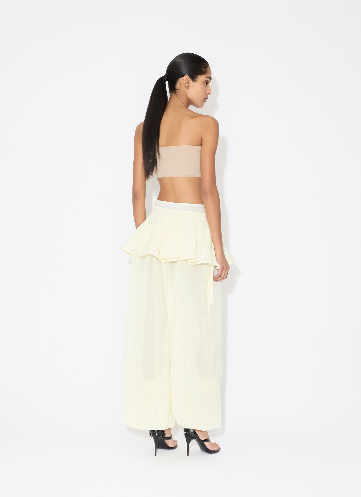 KNIT PEPLUM PANTS ALAÏA YELLOW KNIT PEPLUM PANTS